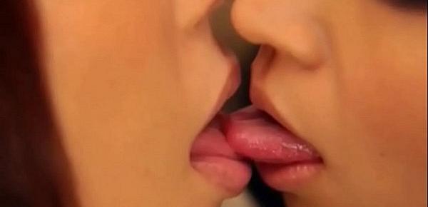  Girl on girl close-up kiss
